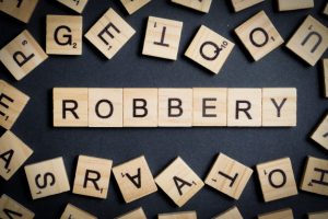 word made wooden letters robbery black breaking